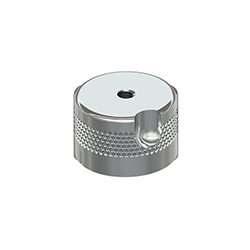 A circular, stainless steel MH106-1A quick disconnect receptacle with a knurled ring around the perimeter, a triaxial accelerometer locating notch on the top right edge, and a through-hole in the center of the top.