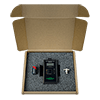 A photo of a CTC PS01A power supply and accessories packaged in a cardboard box with foam insert.