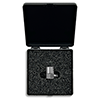 A photo of a TMP TFA110 mini side exit accelerometer in a foam insert inside a black plastic case.