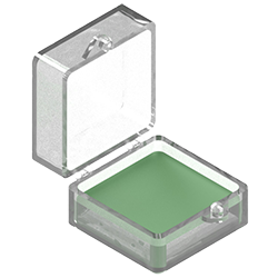 A render of MHT110 green mounting wax in a clear plastic storage case.